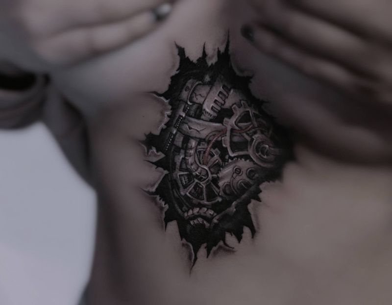 撕裂写实机械纹身图片_胸部腹部欧美写实3D写实纹身图案