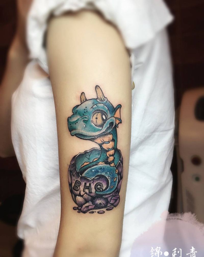 小龙纹身图片_手臂清新动物纹身图案