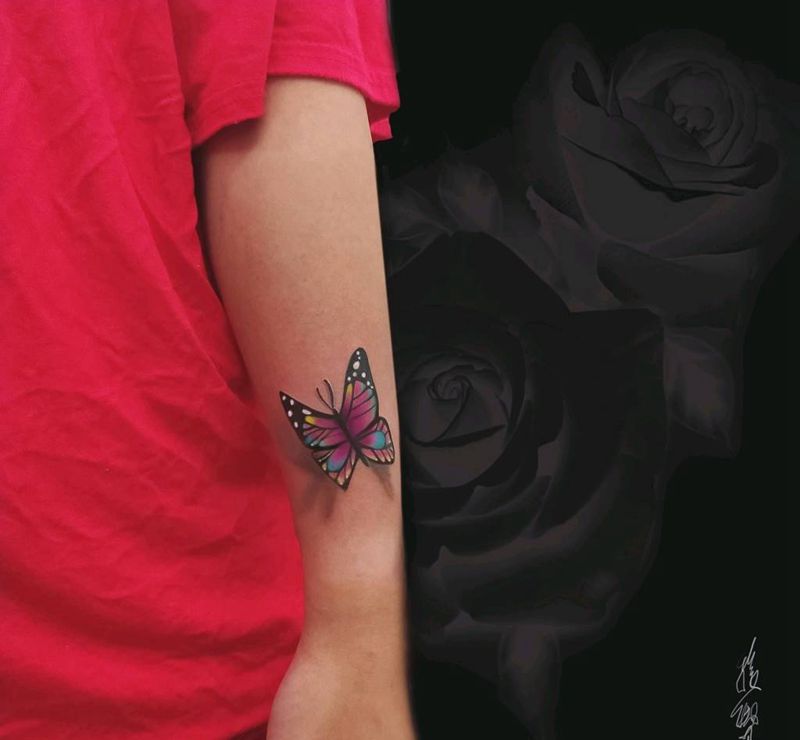 蝶纹身图片_手臂纹身图案