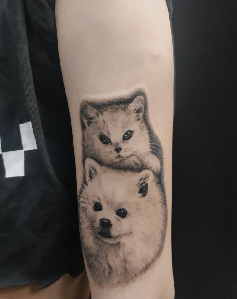 阿喵和阿旺纹身图片_手臂欧美写实纹身图案