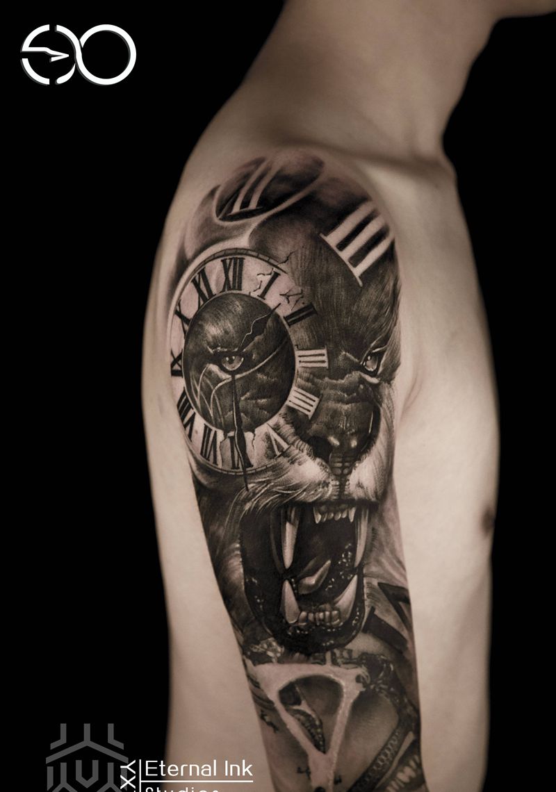 王者纹身图片_手臂手部欧美写实几何狮子时钟纹身图案