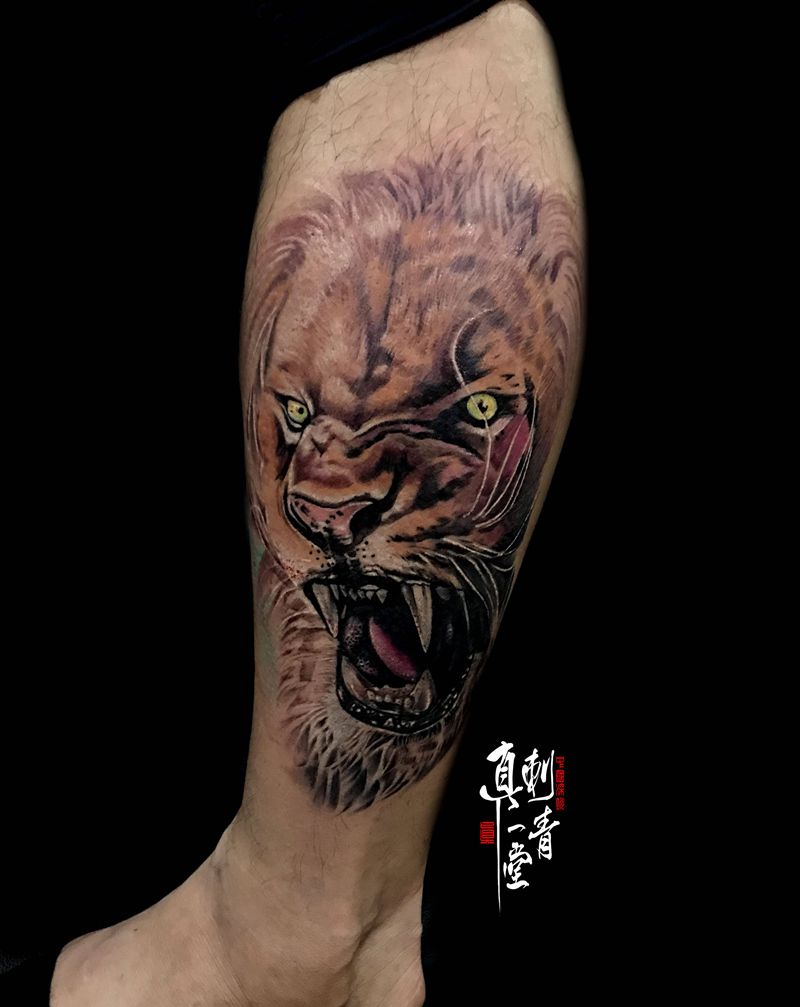 狮子纹身图片_腿部纹身图案