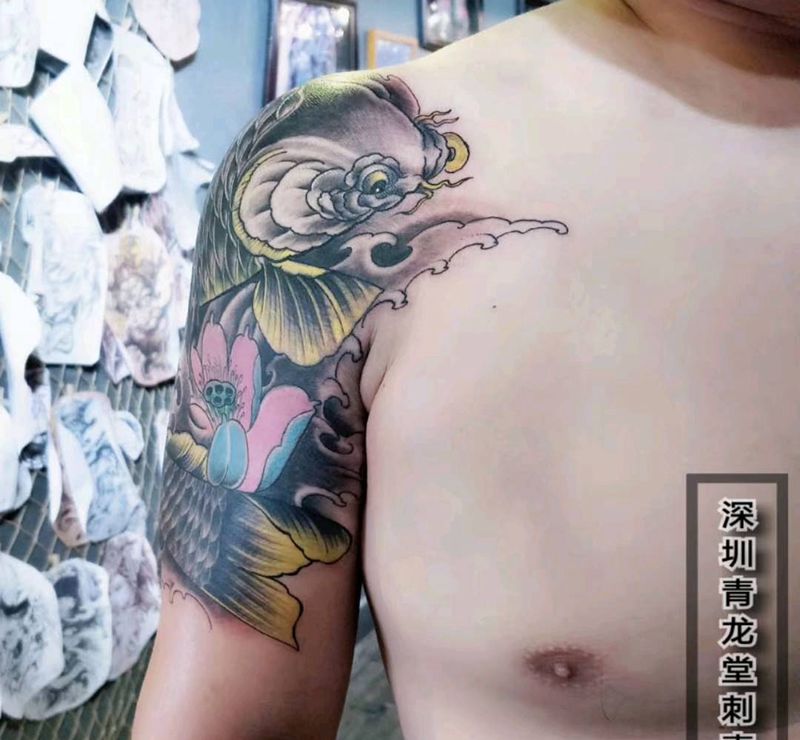 鲤鱼遮盖纹身图片_手臂纹身图案