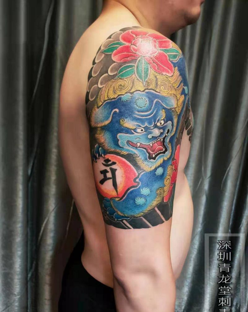 唐狮牡丹纹身图片_手臂胸部老传统纹身图案