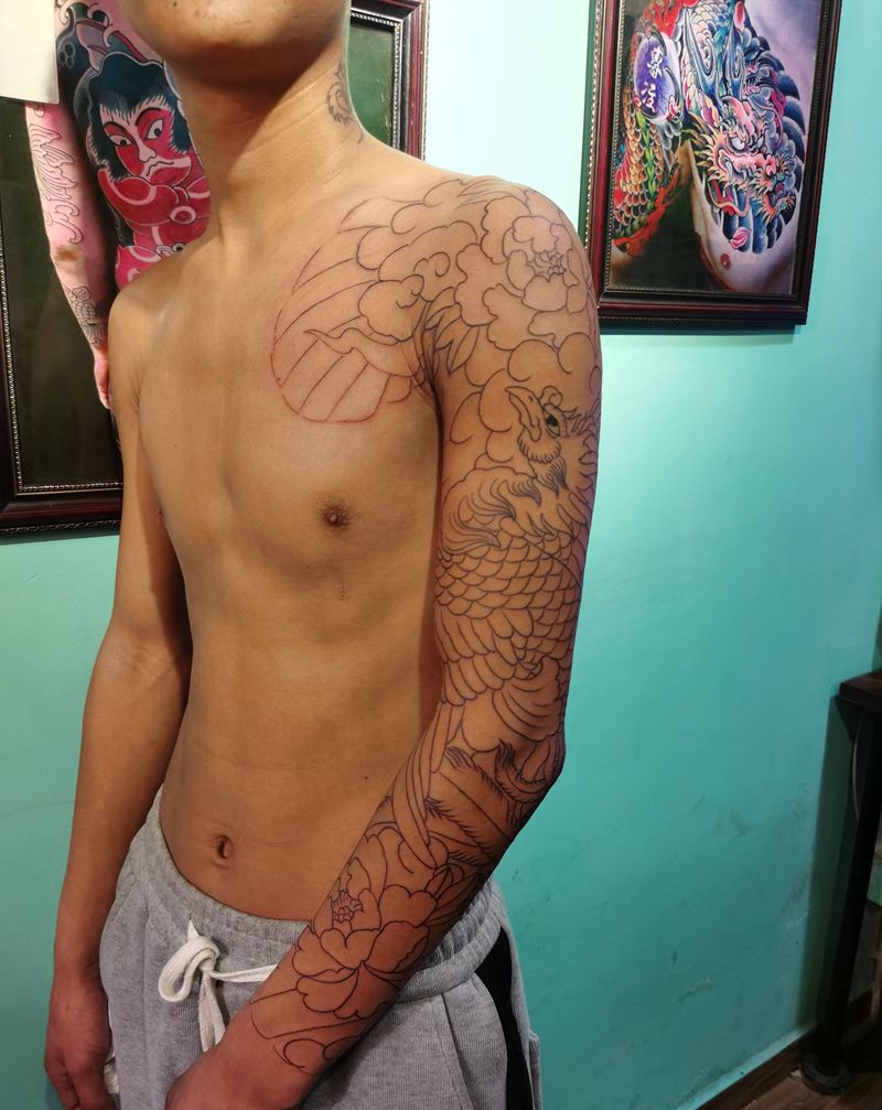 传统花臂未完纹身图片_手臂老传统纹身图案