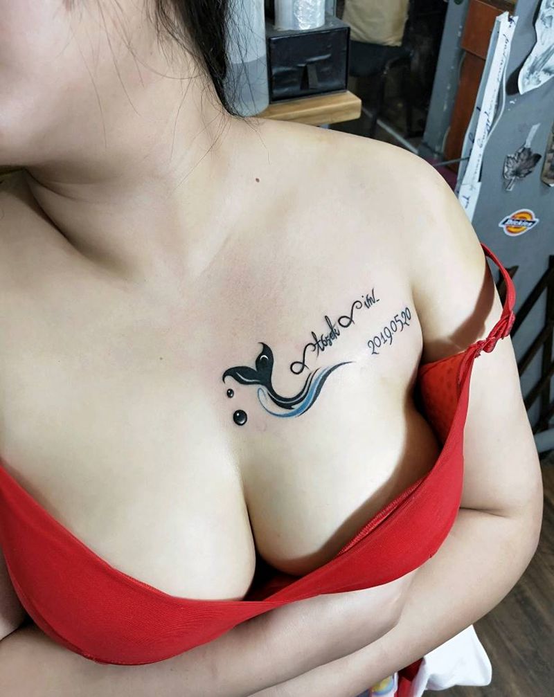 鲸鱼尾巴纹身图片_胸部欧美写实纹身图案