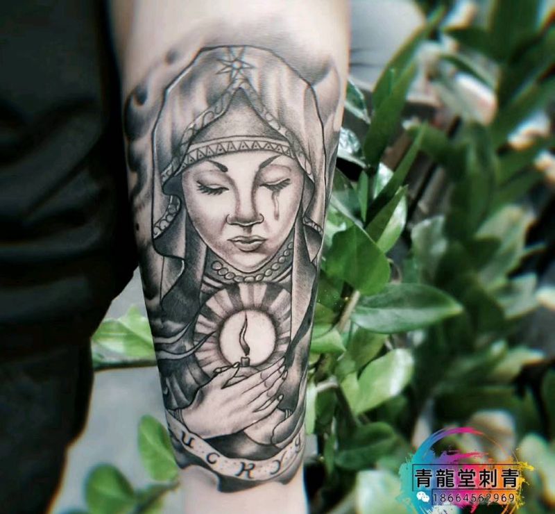 圣母纹身图片_手臂欧美写实纹身图案