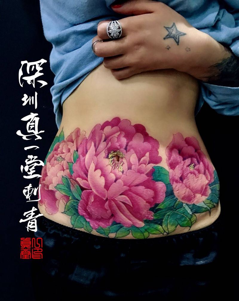 遮盖妊辰纹纹身图片