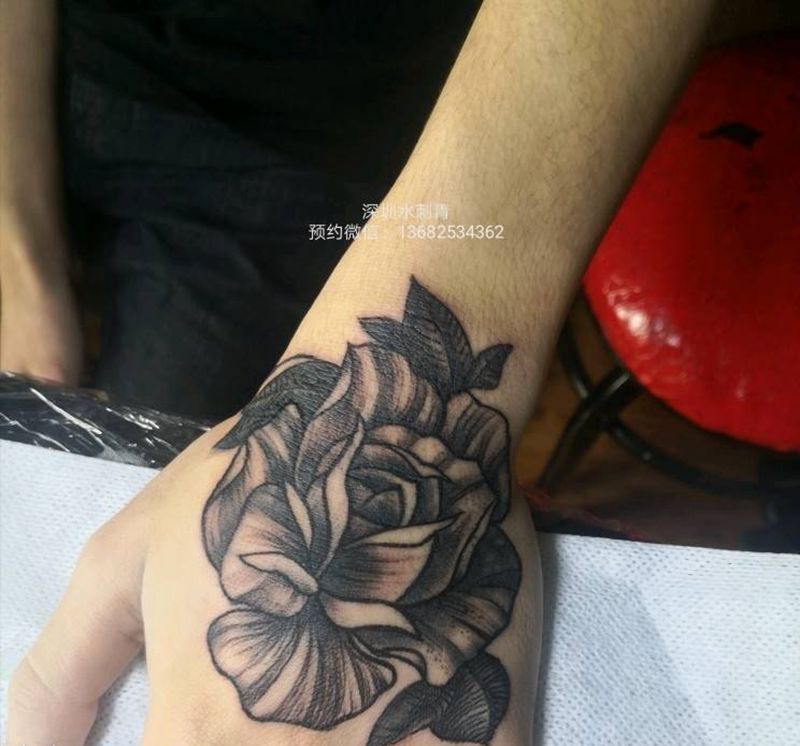 花手纹身图片_手臂纹身图案