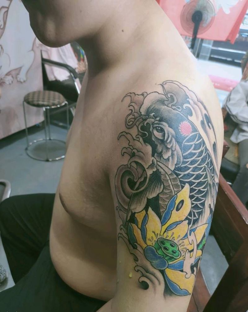 男士手臂鲤鱼纹身图片_手臂新传统纹身图案