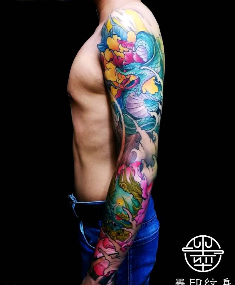 花臂纹身图片_手臂新传统蛇唐狮花臂纹身图案