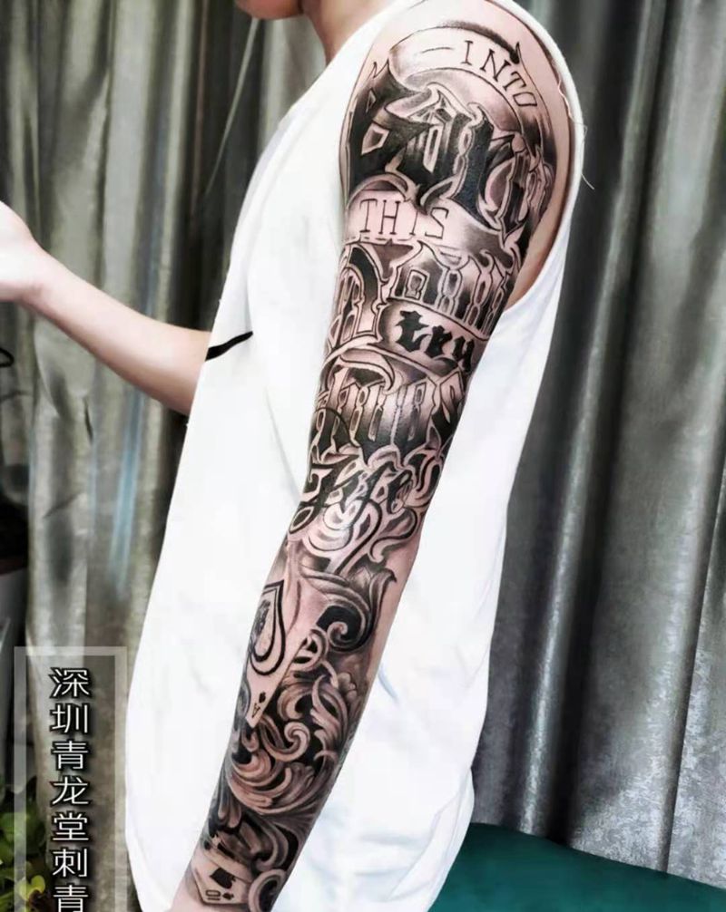 欧美花臂纹身图片_手臂花体字欧美写实纹身图案