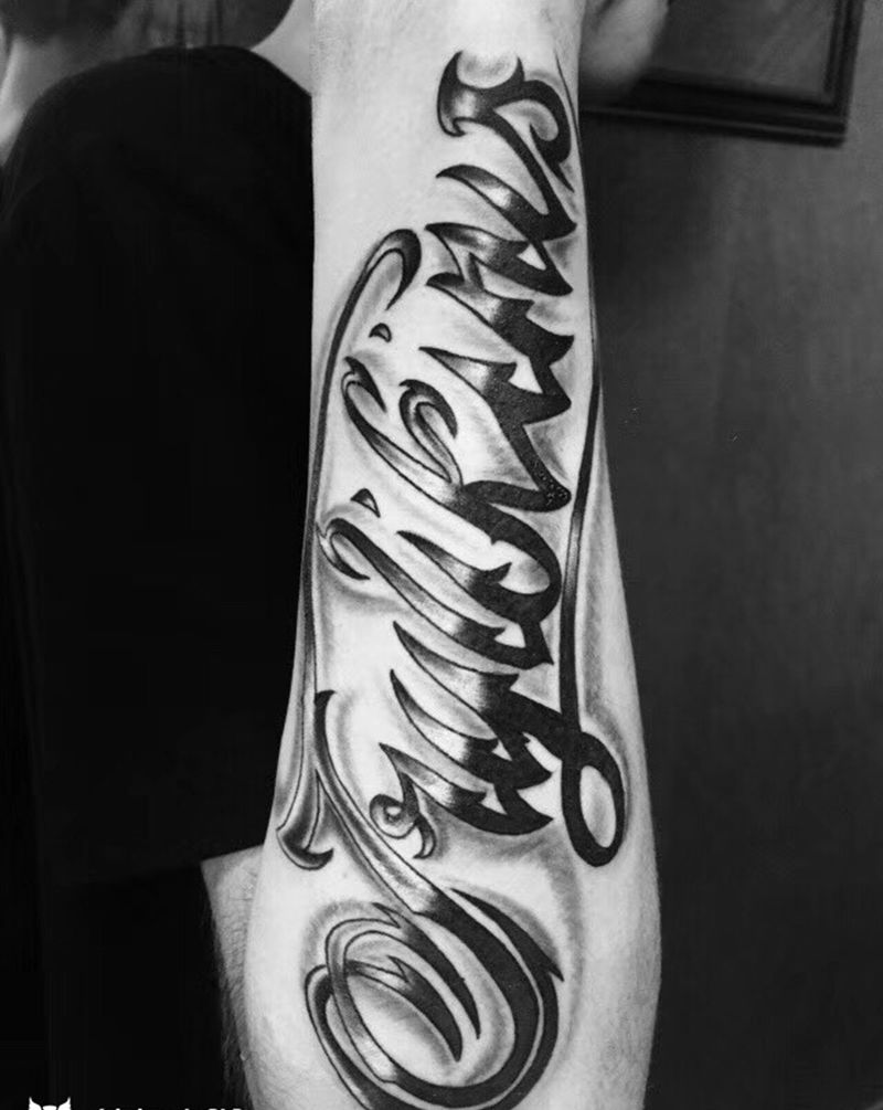 小臂花体纹身图片