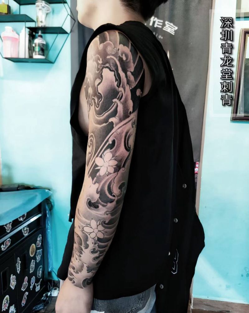 浪臂纹身图片_手臂新传统纹身图案