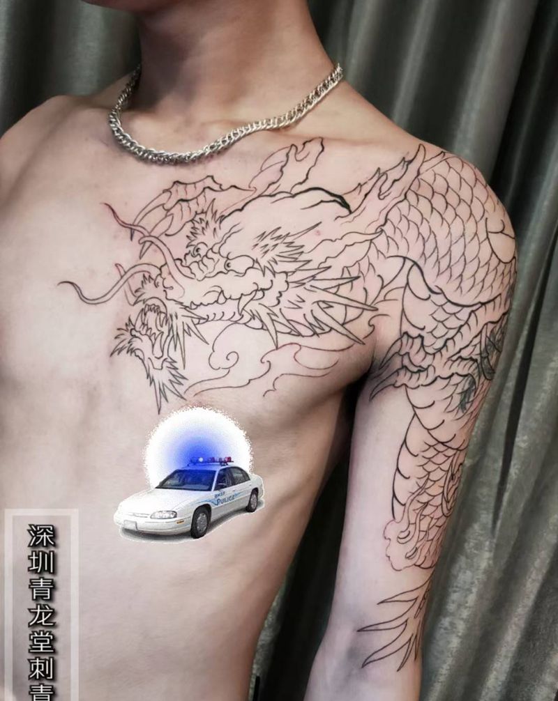过肩龙未完纹身图片_手部胸部新传统纹身图案