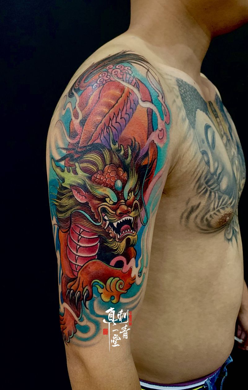 麒麟纹身图片_手臂新传统纹身图案