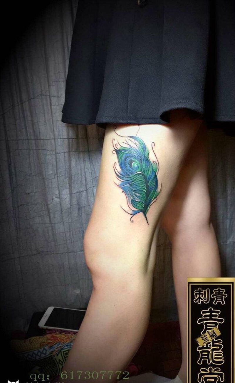小大腿羽毛遮盖旧图纹身图片