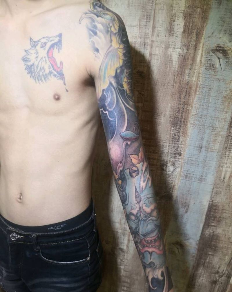 般若鲤鱼花臂纹身图片_手臂纹身图案