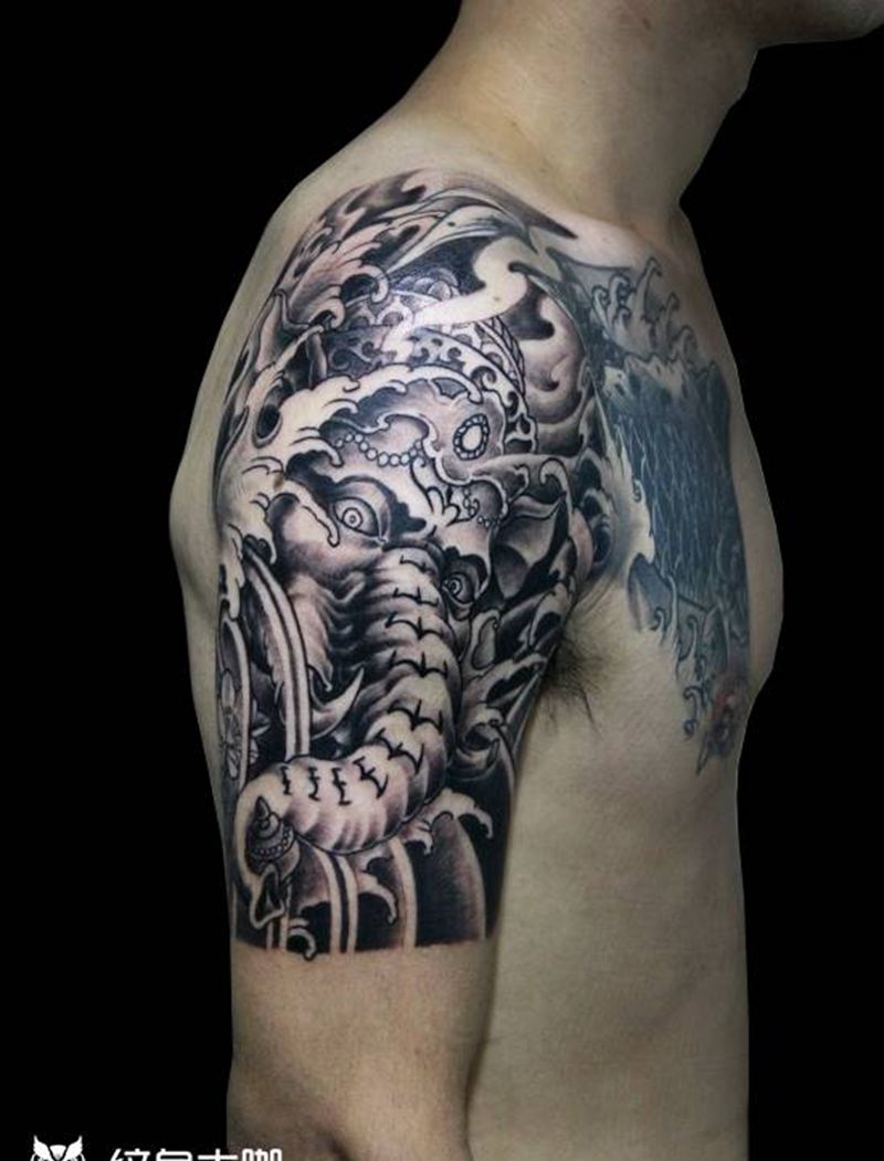 象鼻财神纹身图片_手臂肩部新传统象象财神纹身图案