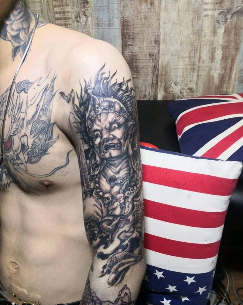 大黑天纹身图片_手臂老传统纹身图案