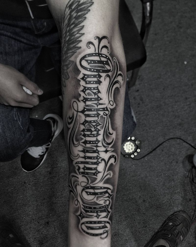 花体字纹身图片_手臂纹身图案