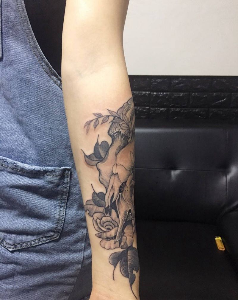 骨头纹身图片_手臂新传统纹身图案