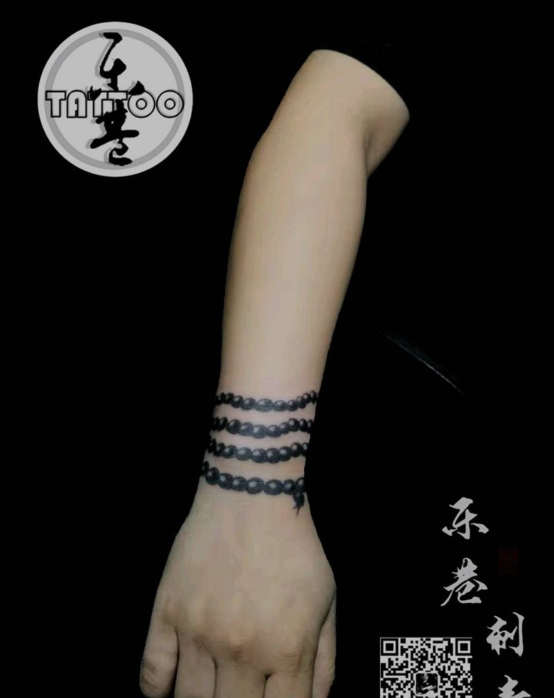 佛珠遮盖图纹身图片_手部纹身图案