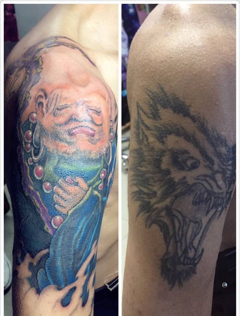 老头盖狼头纹身图片