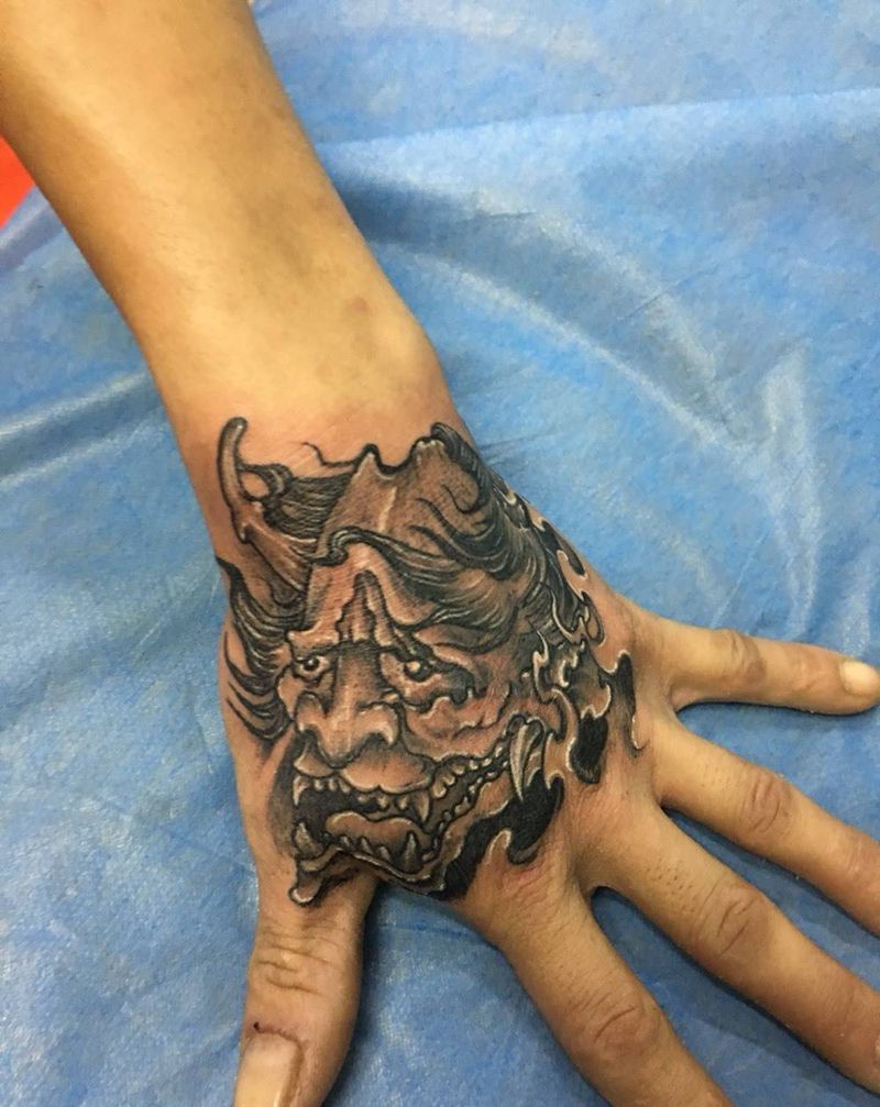 般若纹身图片_成品手部鬼神纹身图案