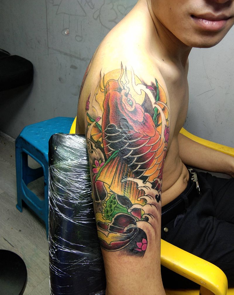 彩色鱼盖图。纹身图片_手臂纹身图案