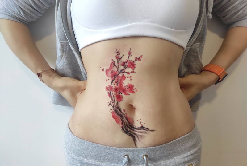 遮盖纹身图片_腹部水墨纹身图案