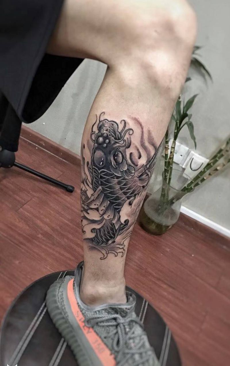 小腿鲤鱼纹身图片