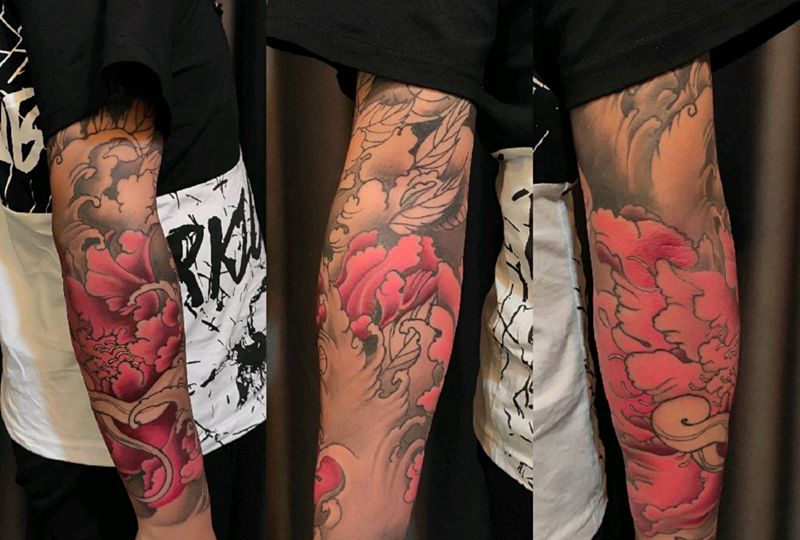 进行中纹身图片_手臂新传统纹身图案