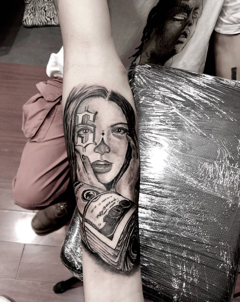 其卡诺女郎纹身图片_手臂欧美写实花体字纹身图案