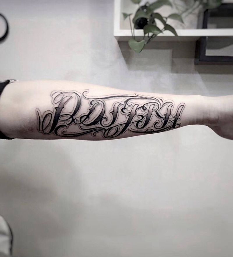 花体字纹身图片_手臂花体字纹身图案