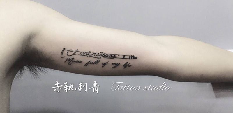 音乐少年 单簧管纹身图片