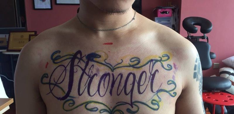 花体字花胸纹身图片