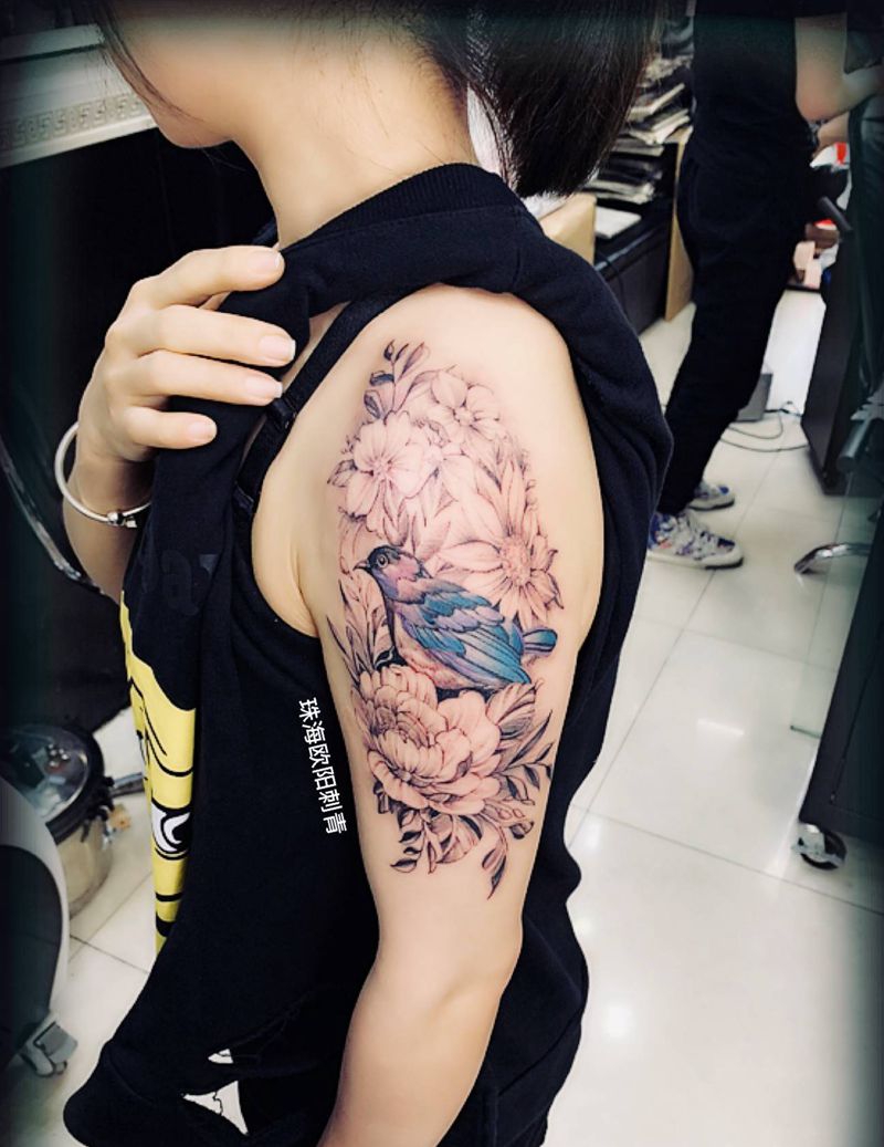 花香鸟语纹身图片_手臂纹身图案