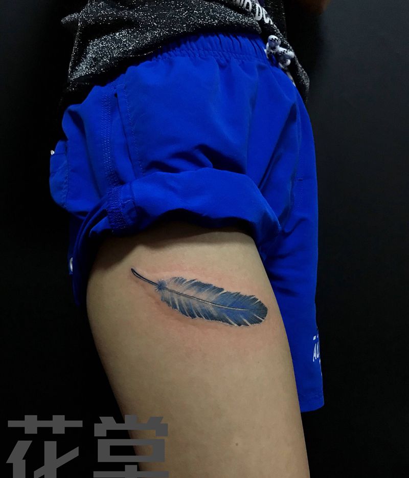 羽毛纹身图片_腿部纹身图案