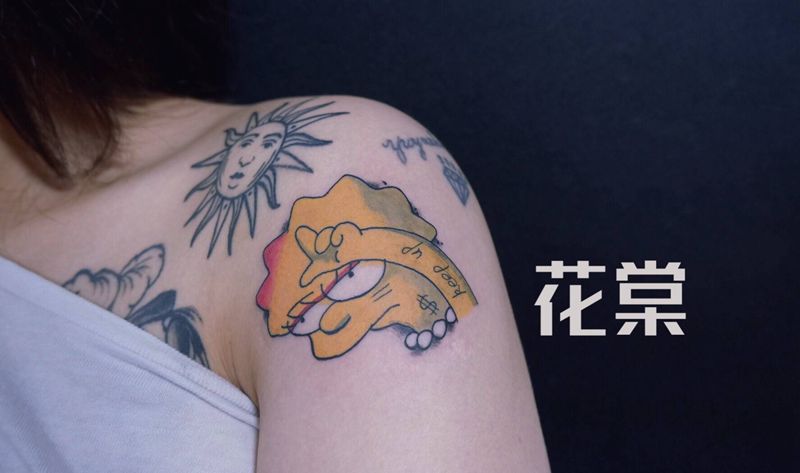 辛普森rock纹身图片_肩部手臂New School新传统纹身图案