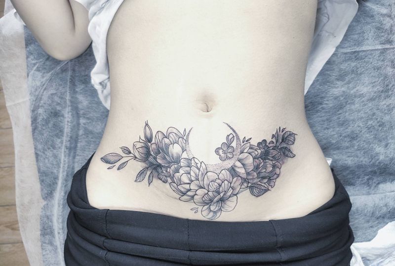 遮盖纹身图片_腹部点刺纹身图案