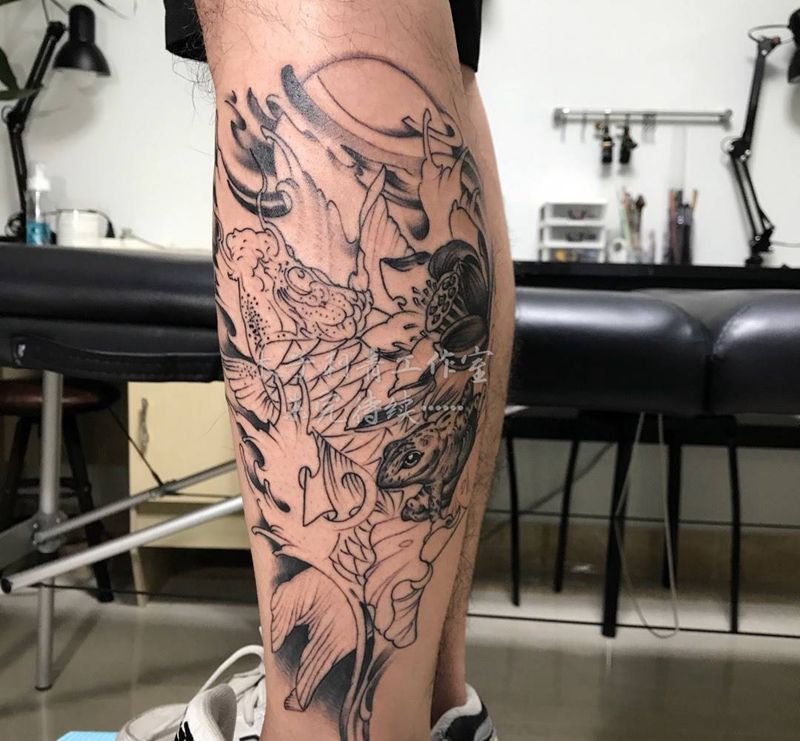 小腿鲤鱼未完待续纹身图片