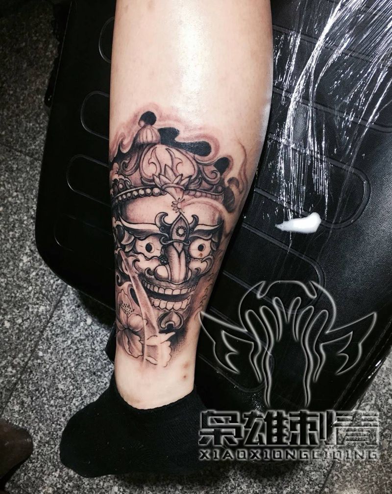 【嘎巴拉】纹身图片_成品脚部传统鬼神纹身图案