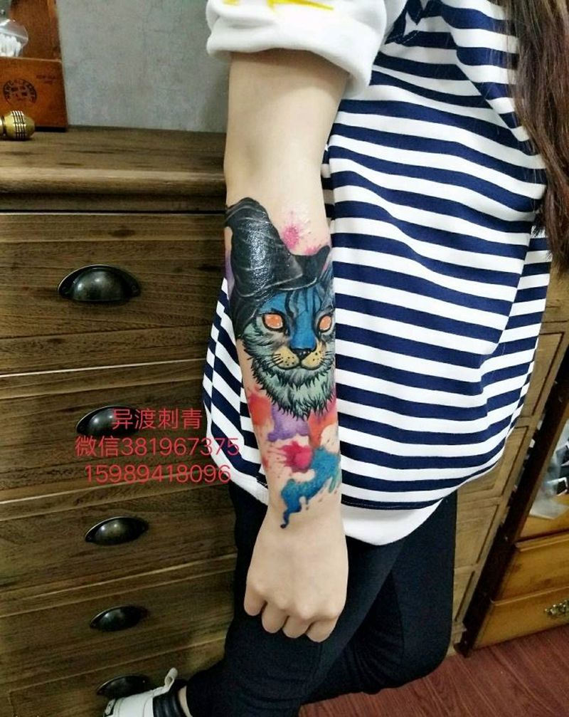 小臂遮盖抽象凤凰纹身图片