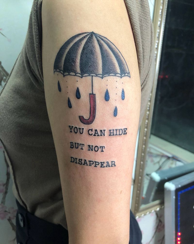 遮风挡雨纹身图片_手臂纹身图案