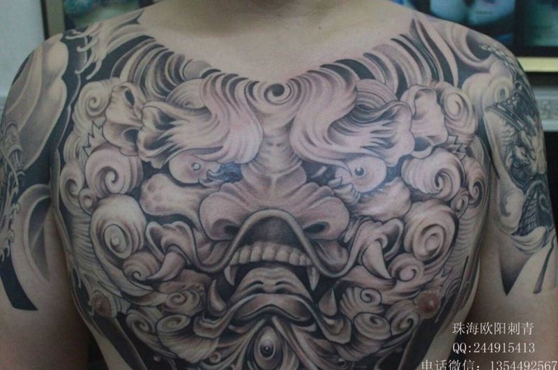 唐狮纹身图片_成品胸部传统动物纹身图案