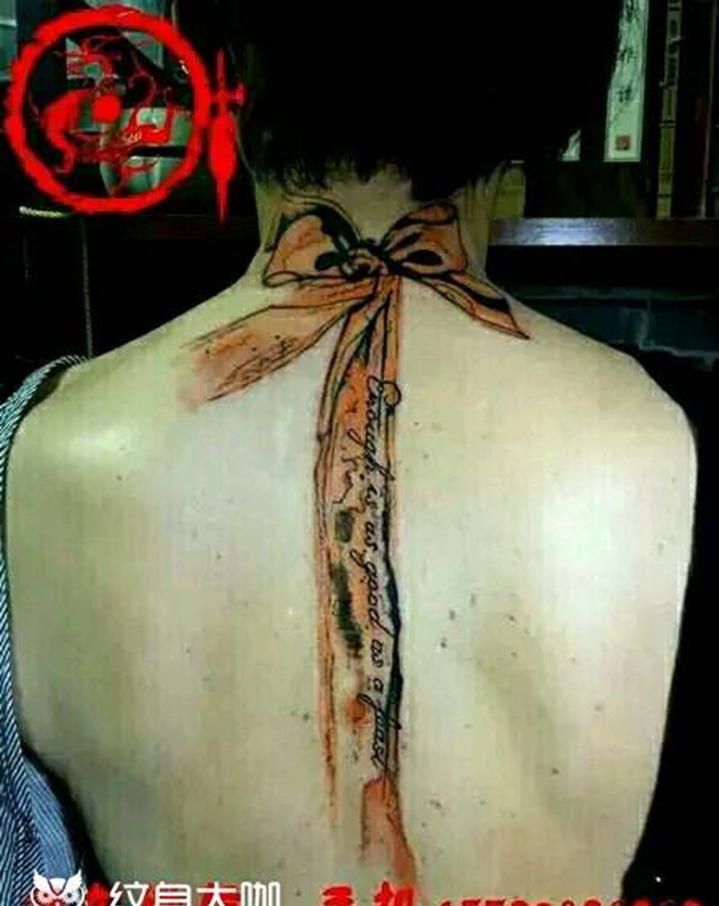 蝴蝶结纹身图片_背部国画静物成品纹身图案