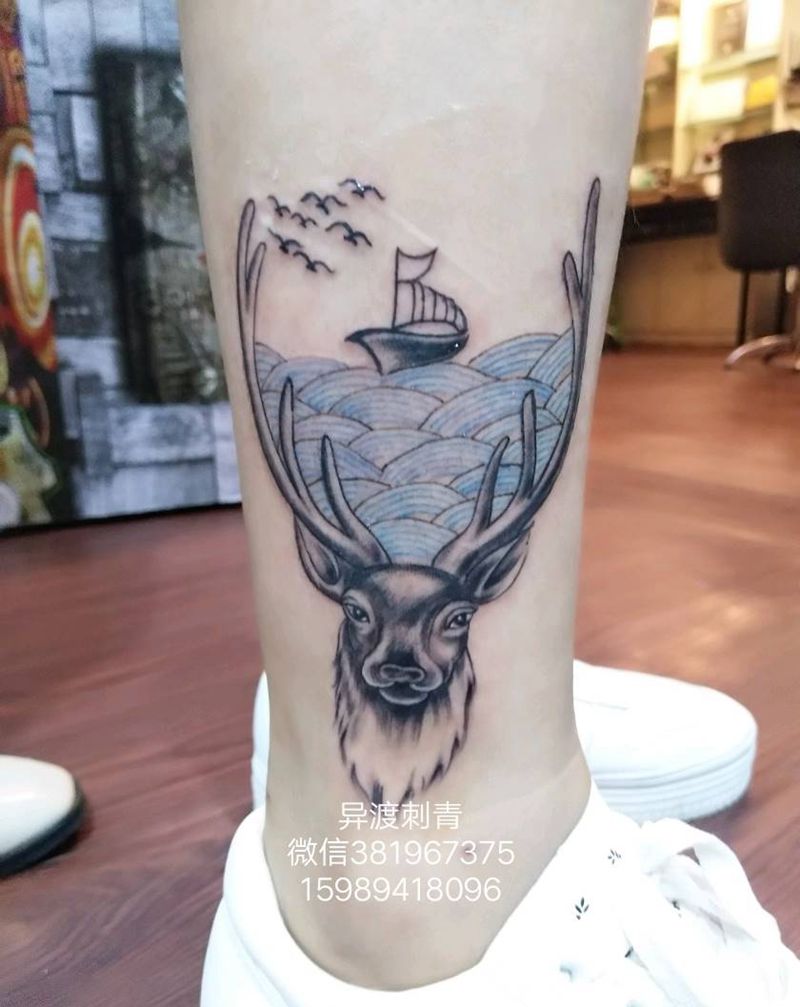 小腿麋鹿纹身图片