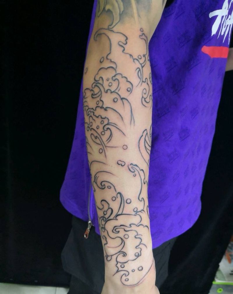 花臂未完待续纹身图片