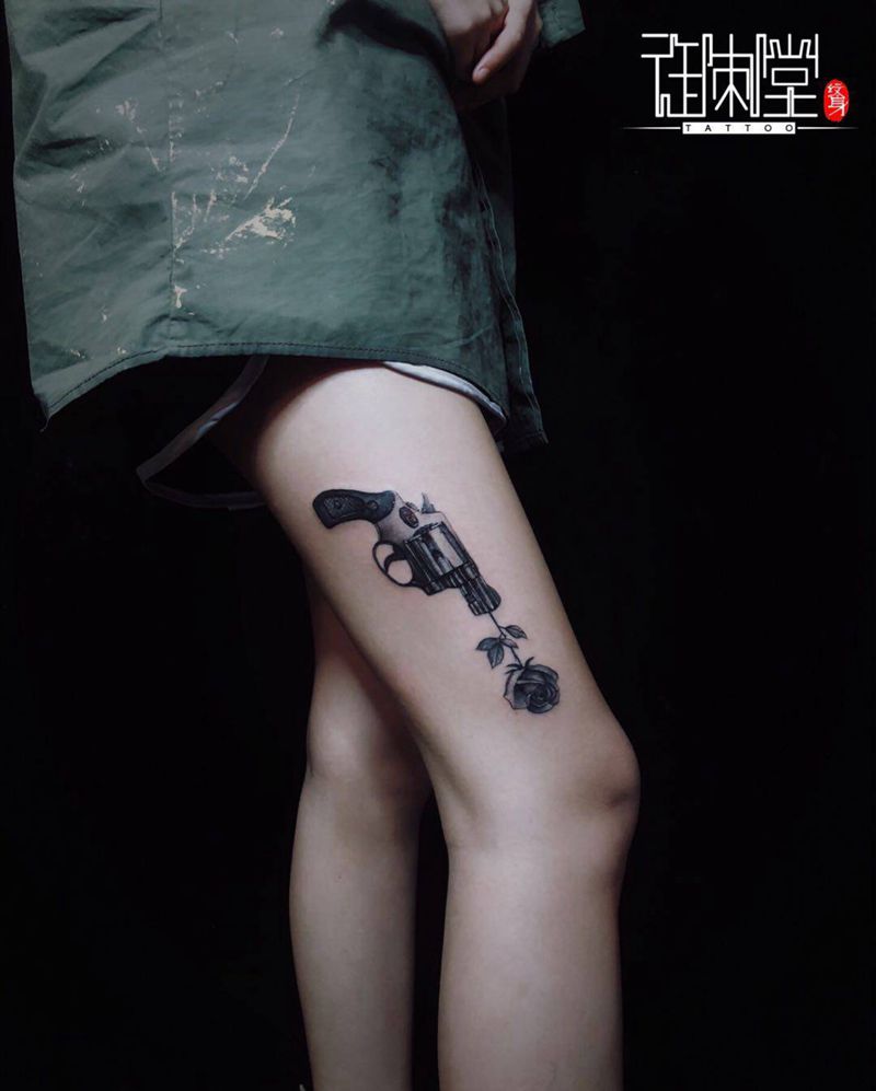 枪纹身图片_腿部欧美写实纹身图案